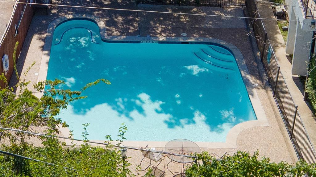 13217 Emily Road, Unit 3209 Dallas, TX 75240 - Photo 26 of 26 a view of swimming pool from a balcony