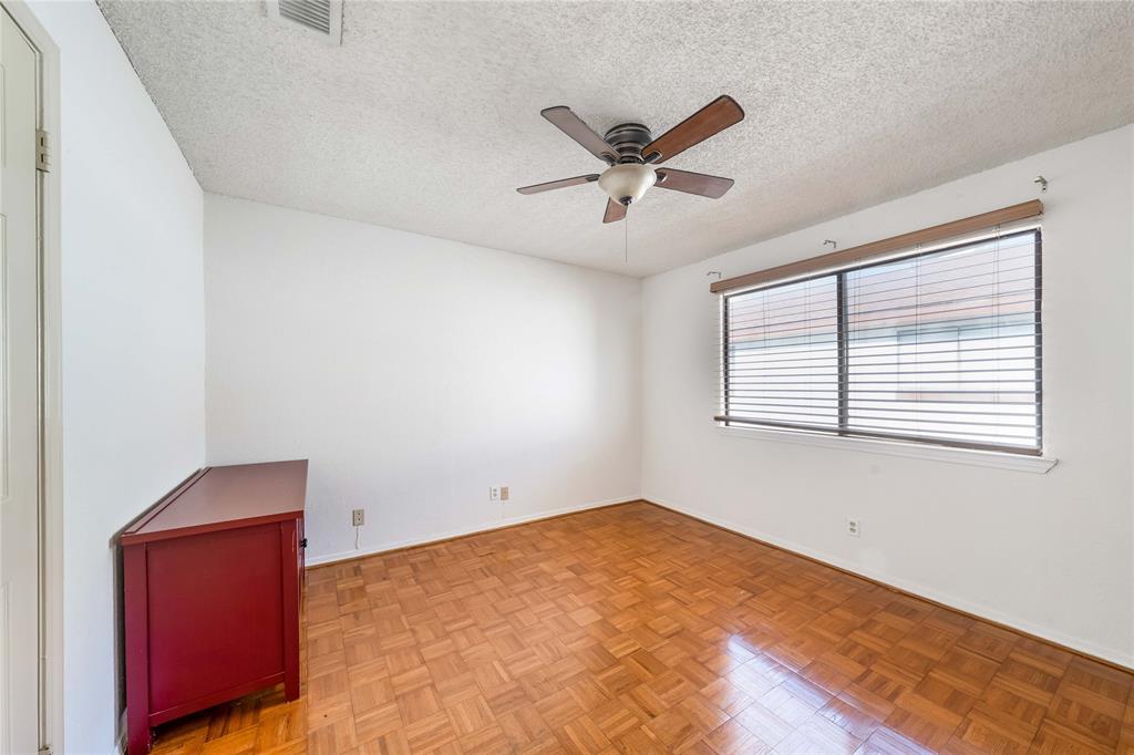 13217 Emily Road, Unit 3209 Dallas, TX 75240 - Photo 9 of 26 a view of a room with a window