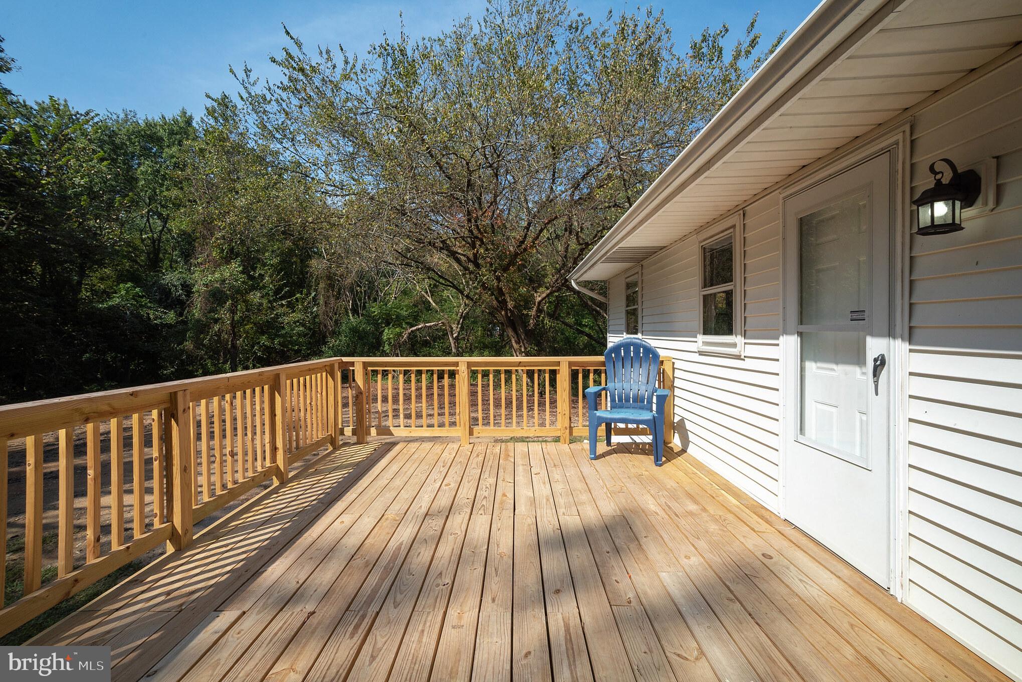 312 Fenwick Road Pilesgrove, NJ 08098 - Photo 27 of 40 a view of deck with a large window and wooden floor