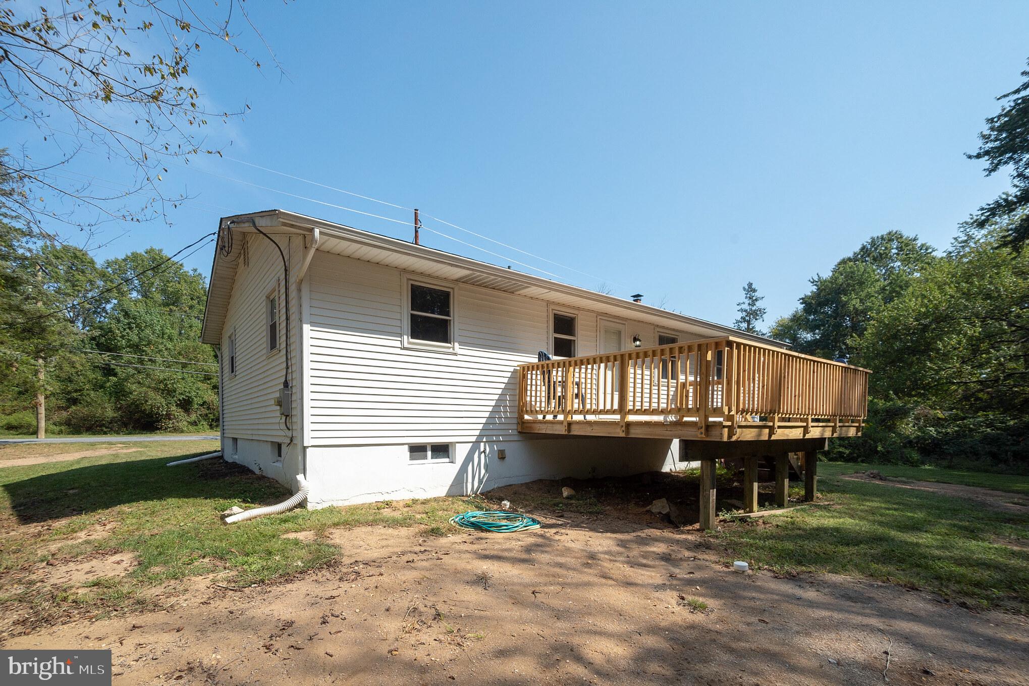 312 Fenwick Road Pilesgrove, NJ 08098 - Photo 29 of 40 a view of a house with a yard balcony and sitting area