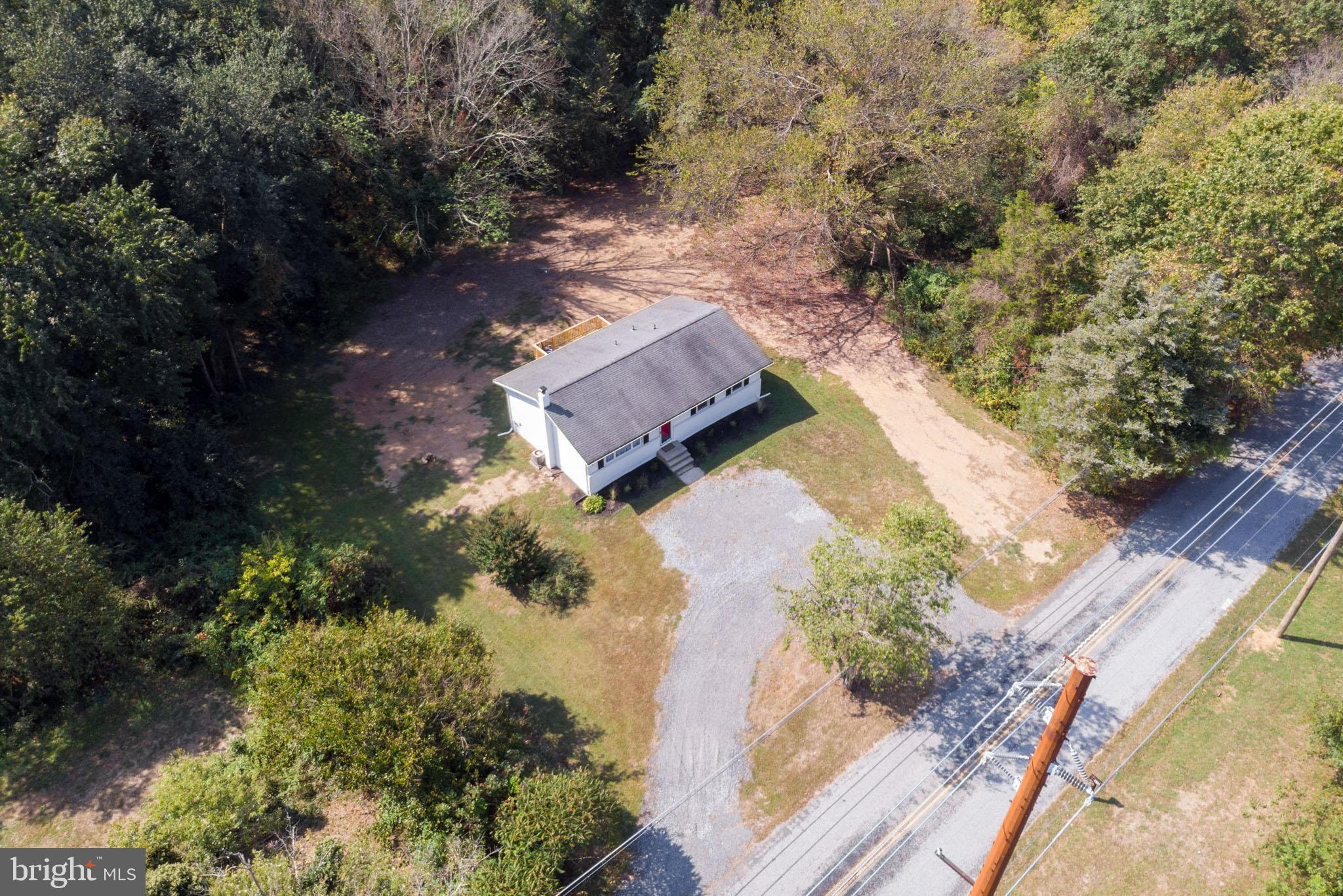 312 Fenwick Road Pilesgrove, NJ 08098 - Photo 34 of 40 an aerial view of a house with a yard