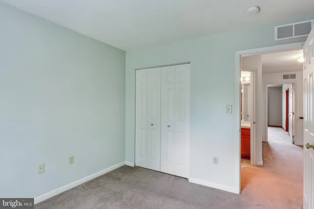 a view of a livingroom with wooden floor
