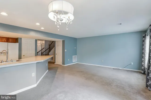 a view of kitchen and sink