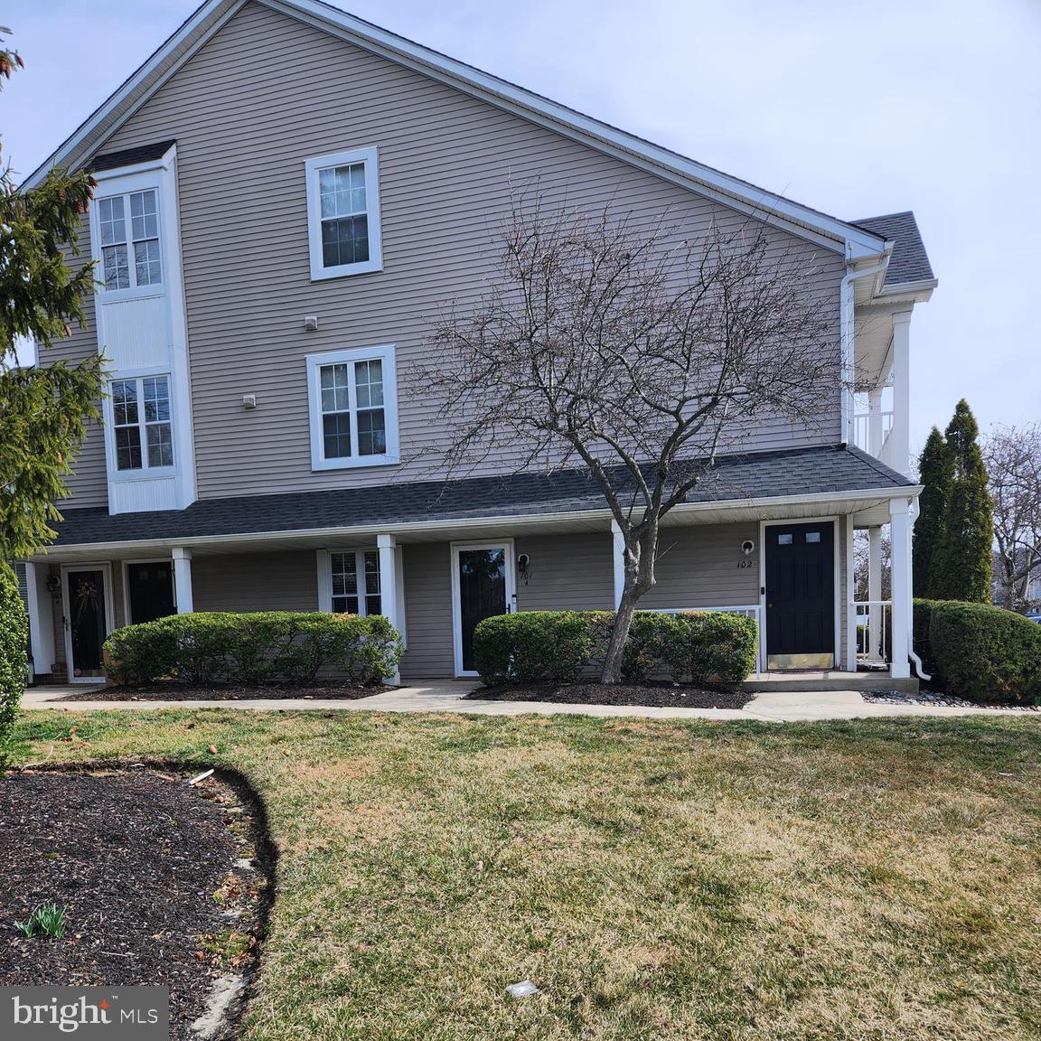 101 A Saxony Drive Mount Laurel, NJ 08054 - Photo 1 of 21 front view of a house with a yard