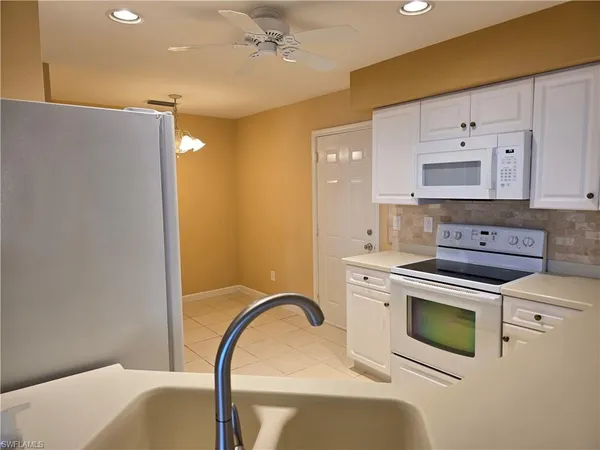 a view of a bathroom with a bathtub