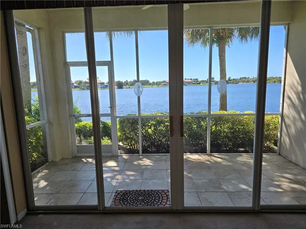 a view of a lake from a balcony