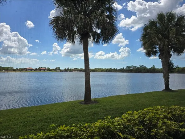 a view of a lake with a garden