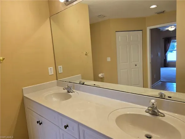 a view of a room that has a window in it