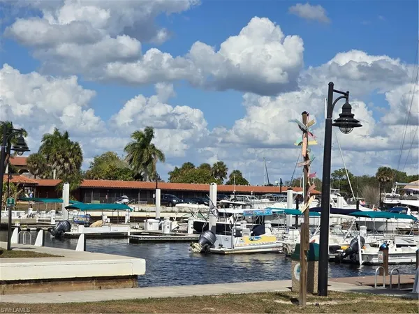 a view of the ocean with boats