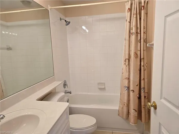 $275,000 | 25069 Peacock Lane, Unit 101, Naples, FL 34114