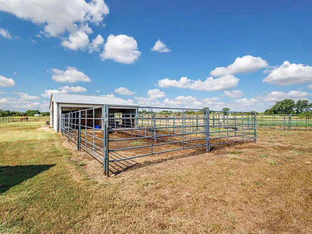 a view of a house with a ocean view