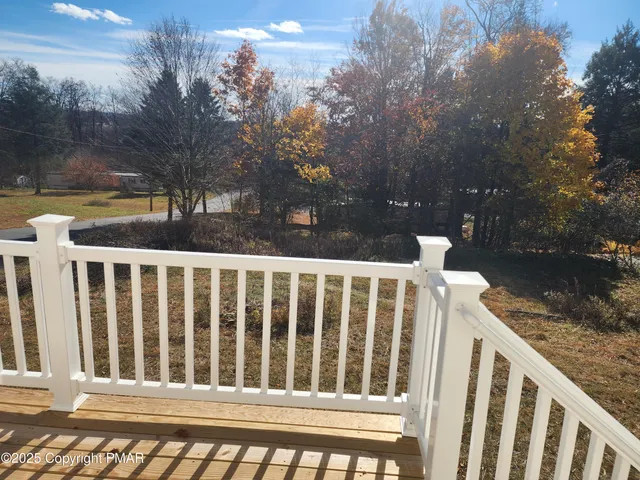 a view of a wooden fence