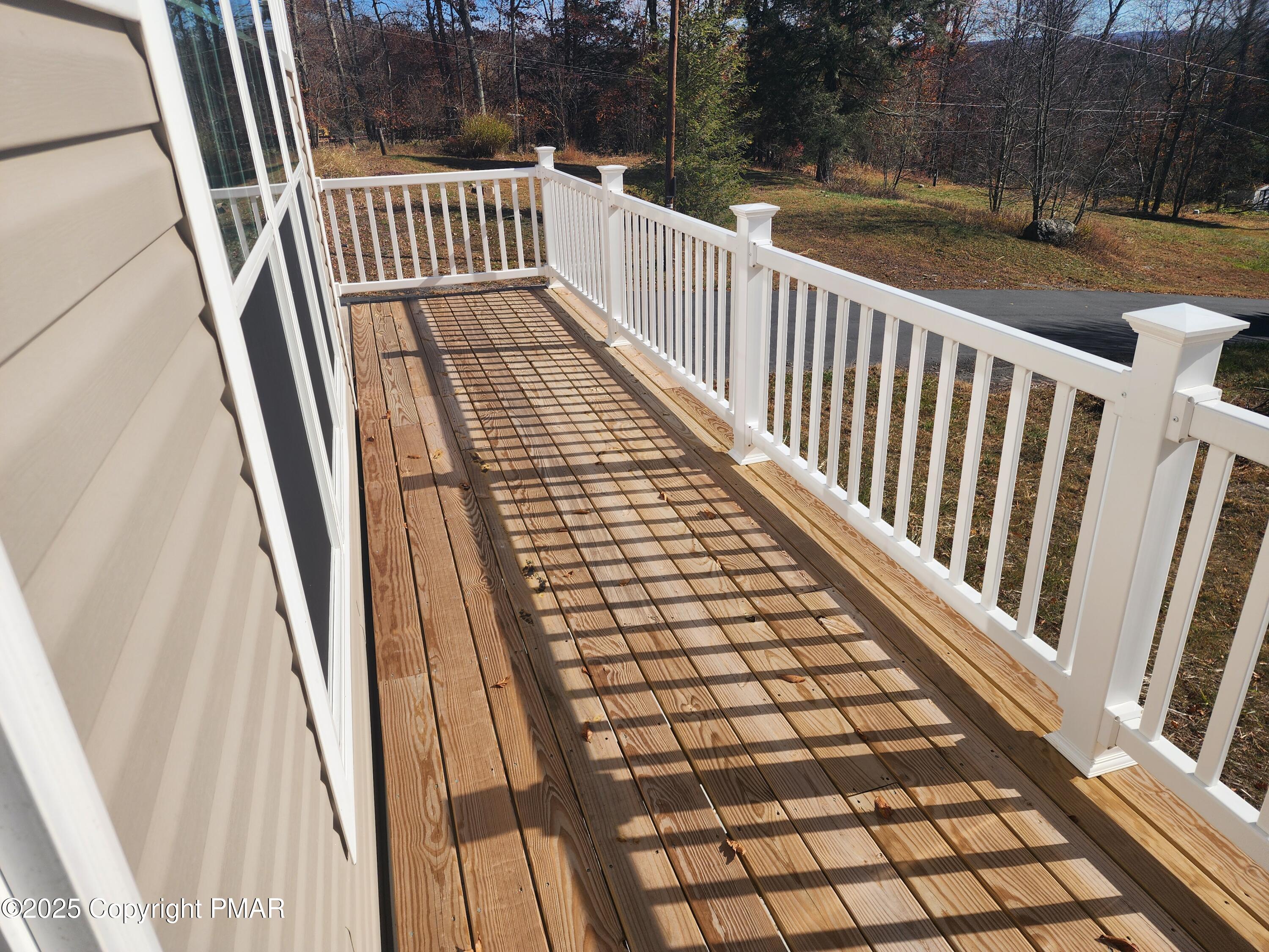 3633 Rocky Hl Road White Haven, PA 18661 - Photo 3 of 7 a view of a balcony with wooden floor