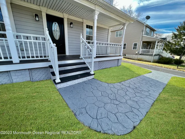 a house view with a garden space