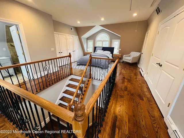 a view of entryway with wooden floor