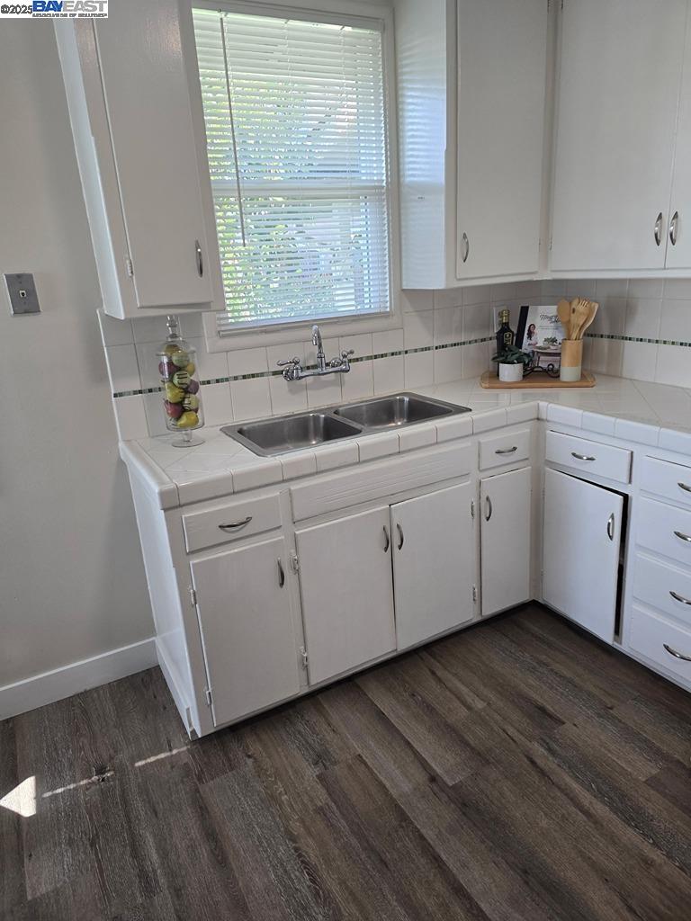 2272 Kelly Street Hayward, CA 94541 - Photo 12 of 32 a kitchen with a sink cabinets and window