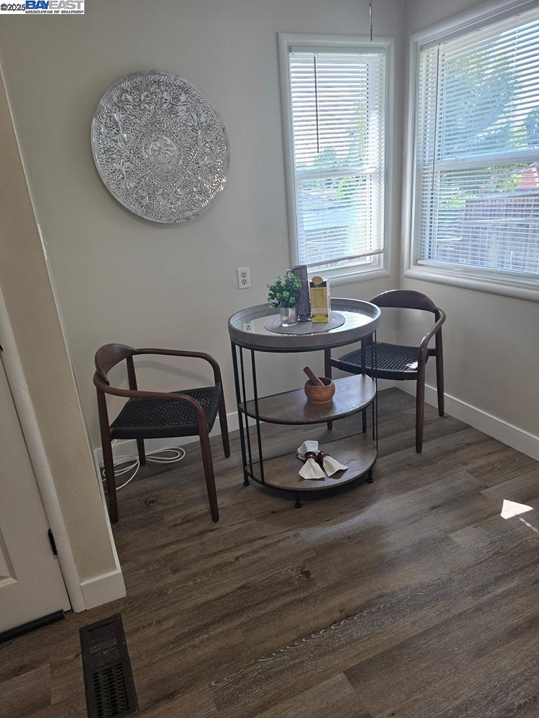 2272 Kelly Street Hayward, CA 94541 - Photo 13 of 32 a view of a dining room with furniture window and wooden floor