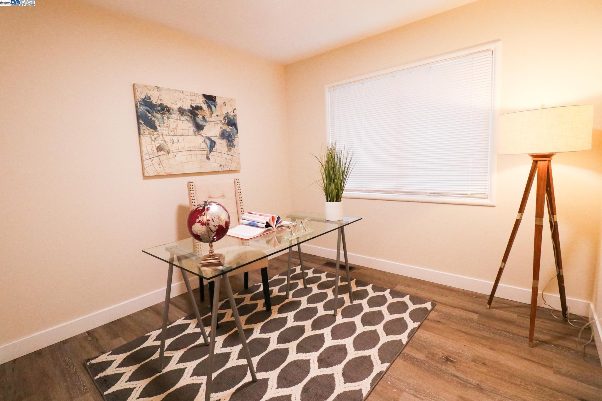 2272 Kelly Street Hayward, CA 94541 - Photo 20 of 32 a living room with a rug and a table