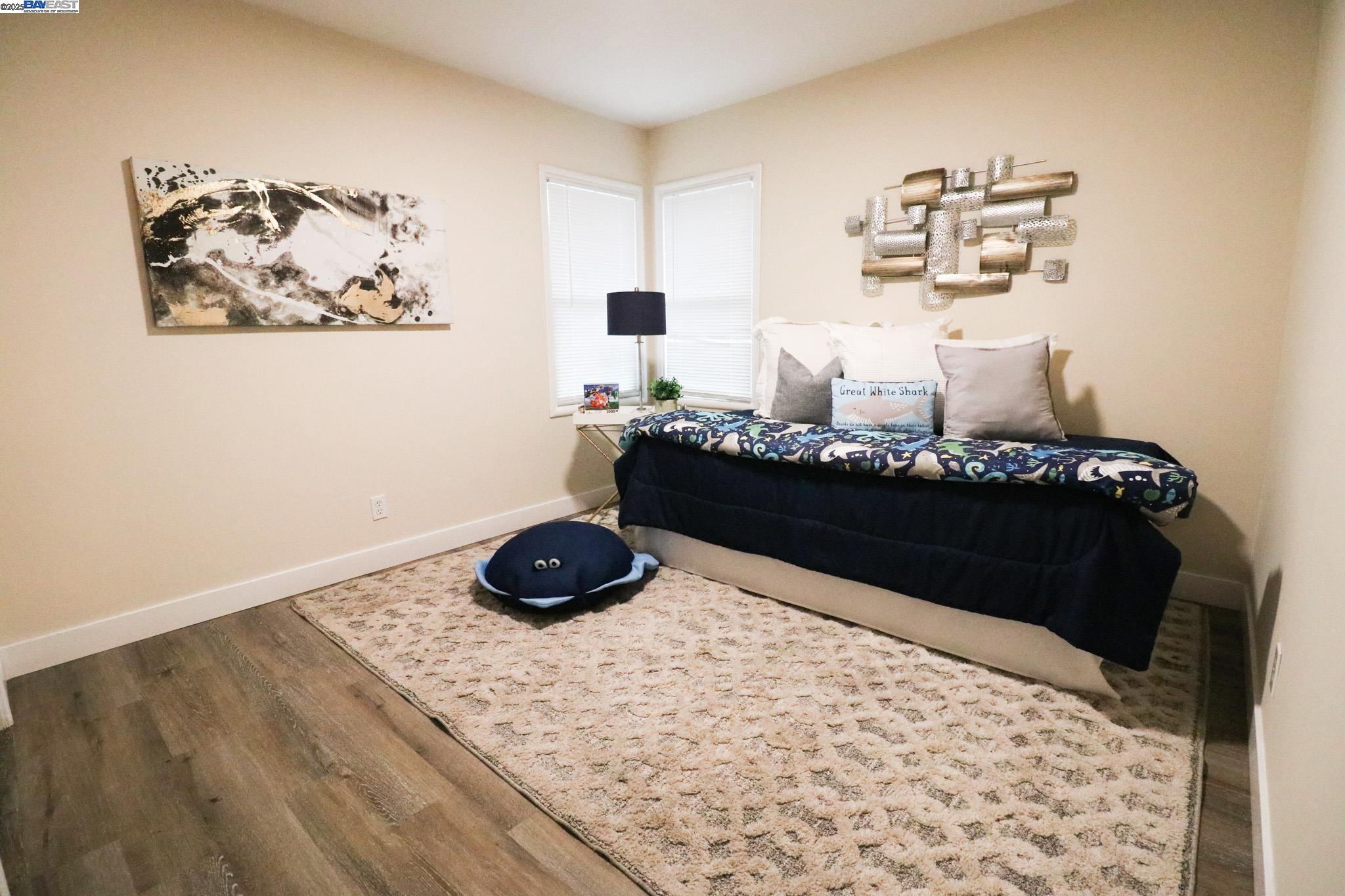 2272 Kelly Street Hayward, CA 94541 - Photo 23 of 32 a bedroom with a bed and a dresser