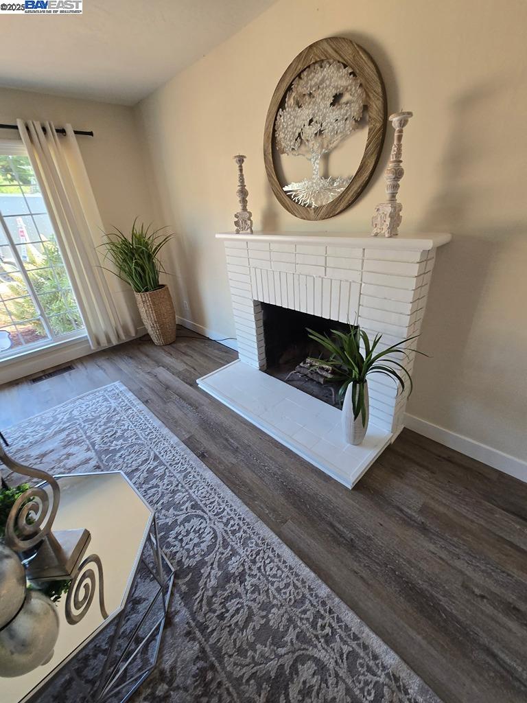 2272 Kelly Street Hayward, CA 94541 - Photo 5 of 32 a living room with furniture and a fireplace