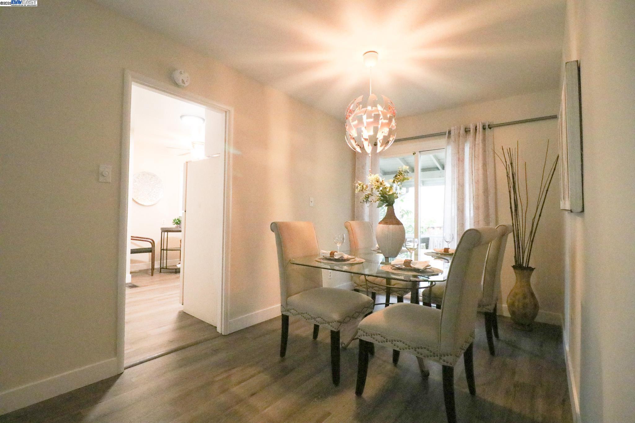 2272 Kelly Street Hayward, CA 94541 - Photo 9 of 32 a view of a dining room with furniture and wooden floor