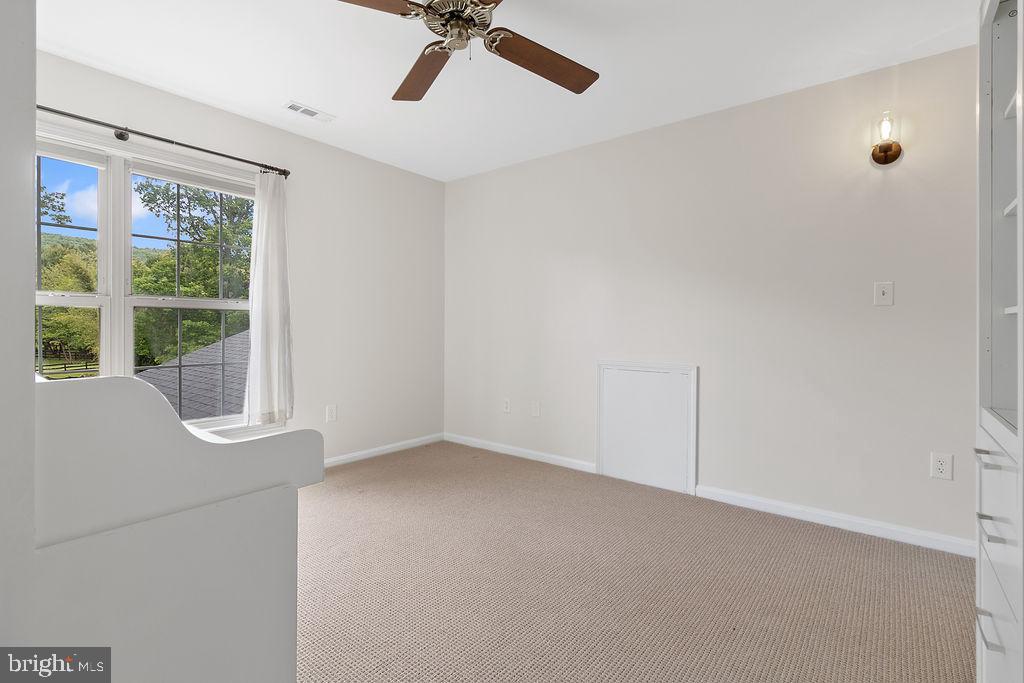 19821 Foggy Bottom Road Bluemont, VA 20135 - Photo 74 of 92 a view of an empty room with a window