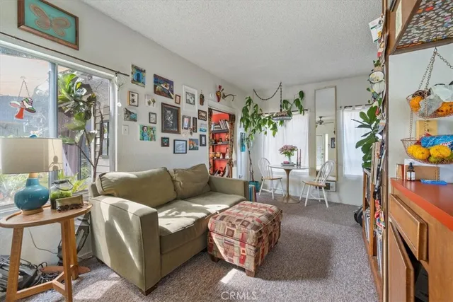 a living room with furniture and a couch