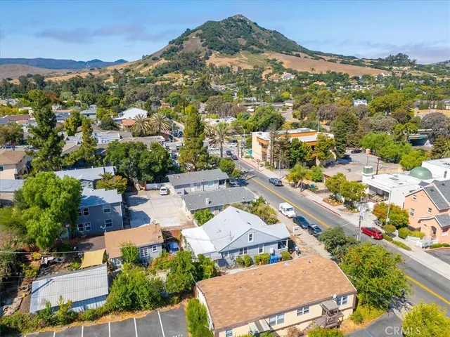 an aerial view of residential houses and outdoor space
