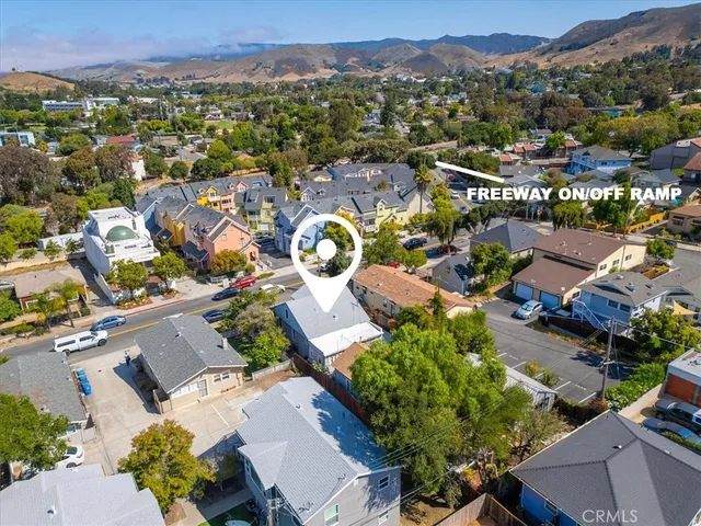 an aerial view of residential house with outdoor space