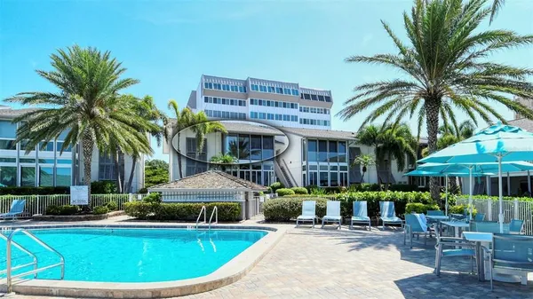 a view of a cafe with sitting area and furniture