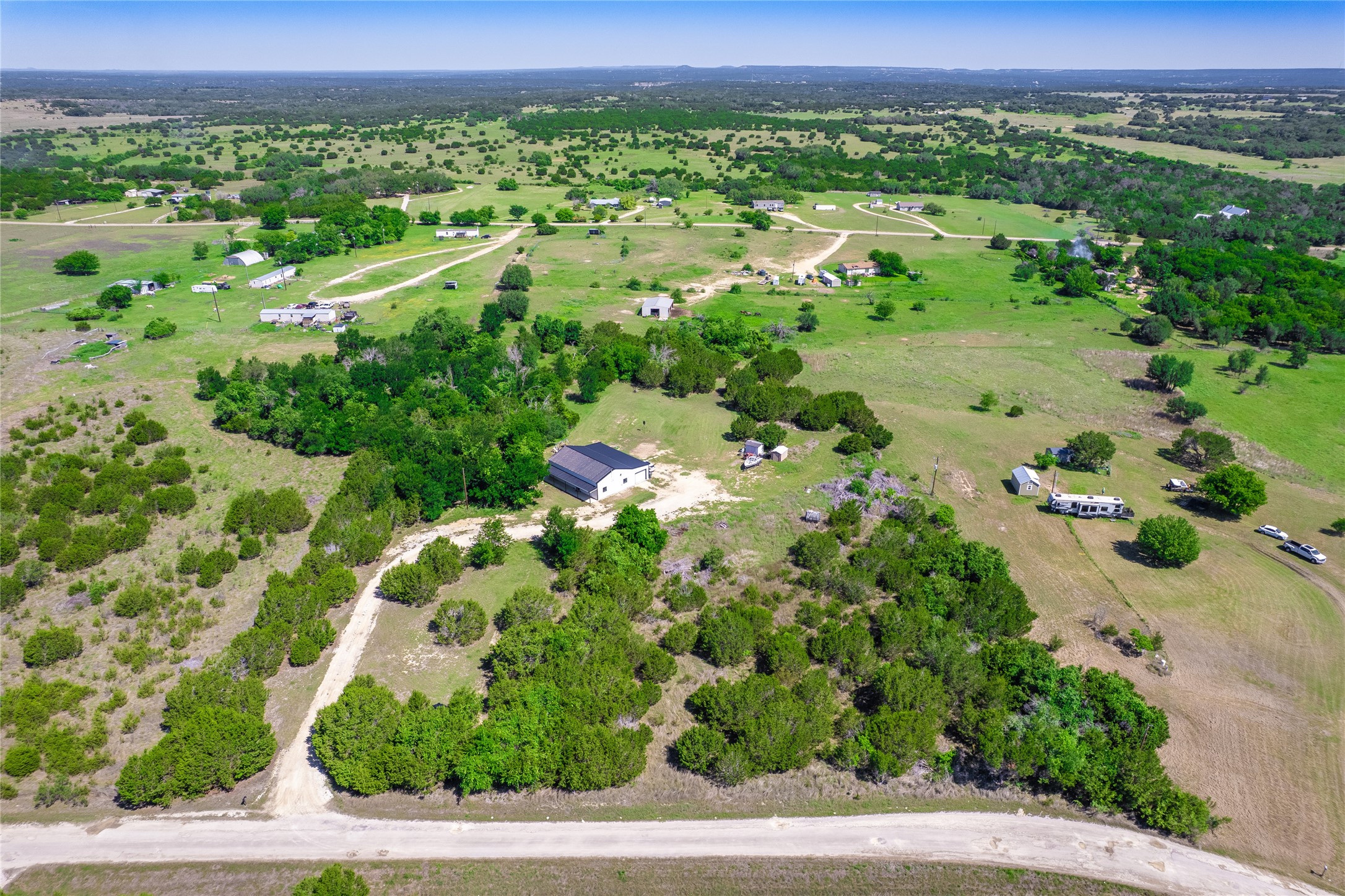 411 Avila Lane Briggs, TX 78608 - Photo 34 of 39 a view of a garden with an outdoor space