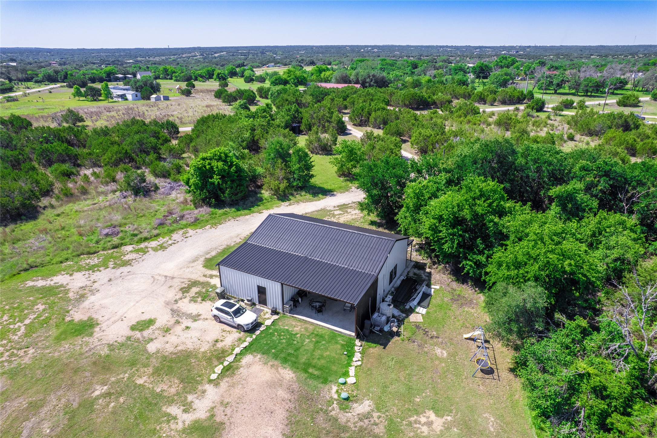 411 Avila Lane Briggs, TX 78608 - Photo 37 of 39 a view of a back yard