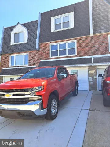 a car parked in front of a building