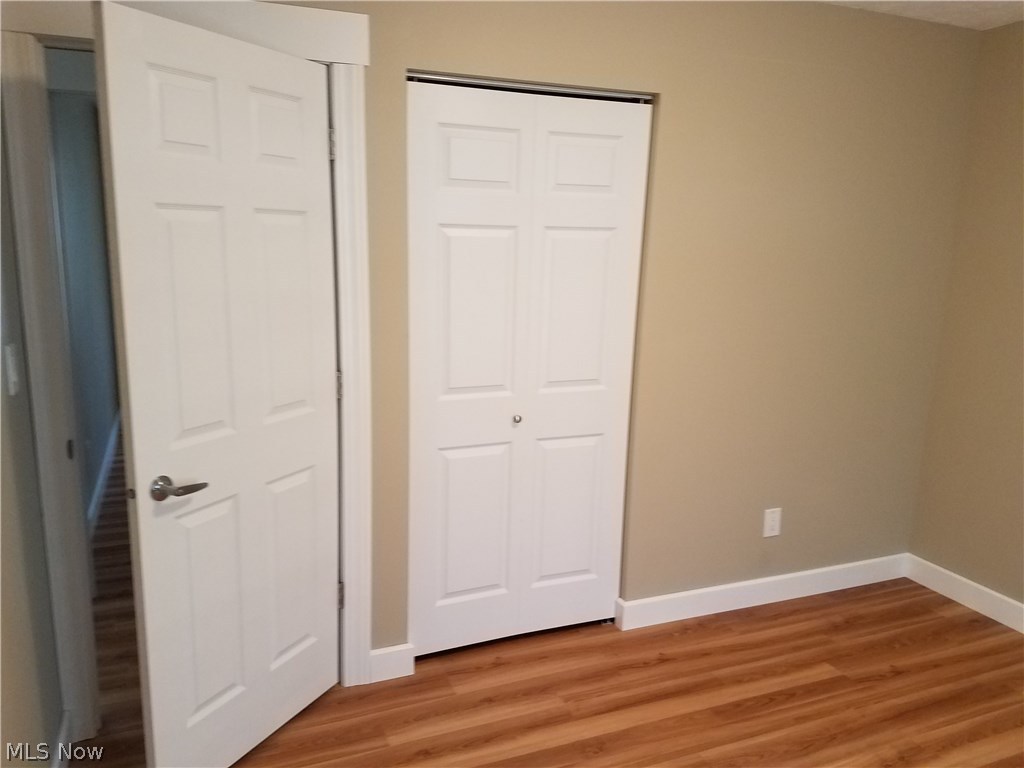 75 East Ohio Avenue Rittman, OH 44270 - Photo 10 of 17 Front Bedroom door and closet view