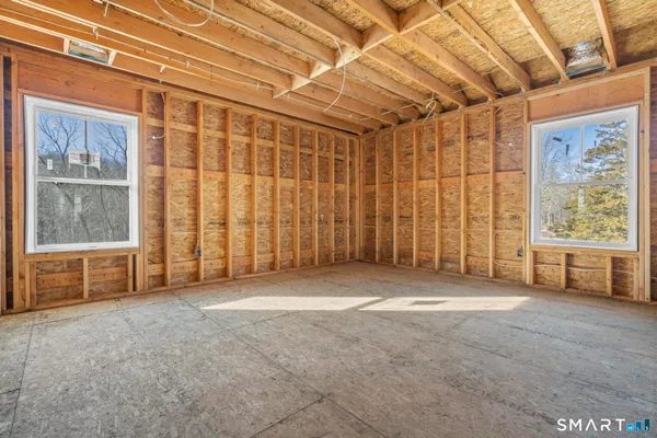 an empty room with windows