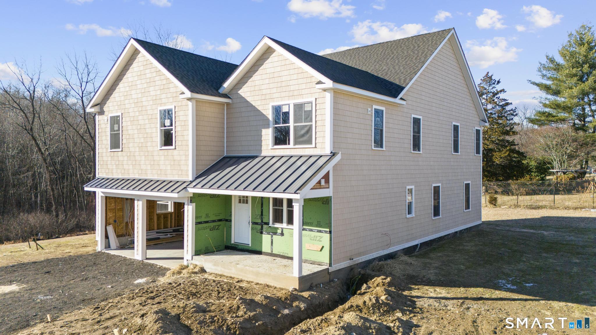 154 A Long Meadow Hill Road Brookfield, CT 06804 - Photo 2 of 24 a view of a house with a yard and sitting area