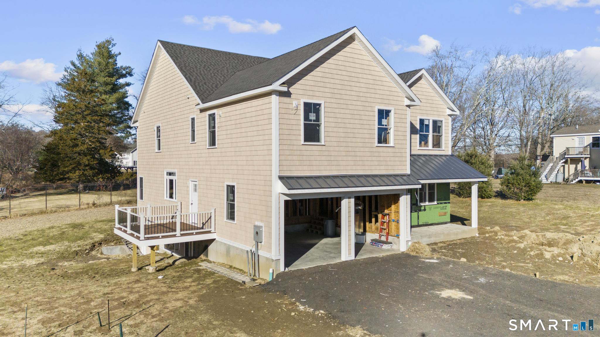 154 A Long Meadow Hill Road Brookfield, CT 06804 - Photo 28 of 28 a view of a house with a yard and sitting area