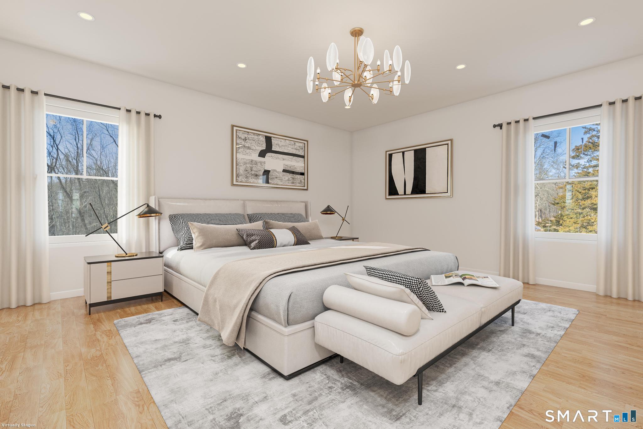 154 A Long Meadow Hill Road Brookfield, CT 06804 - Photo 7 of 28 a bedroom with a large bed and a couch