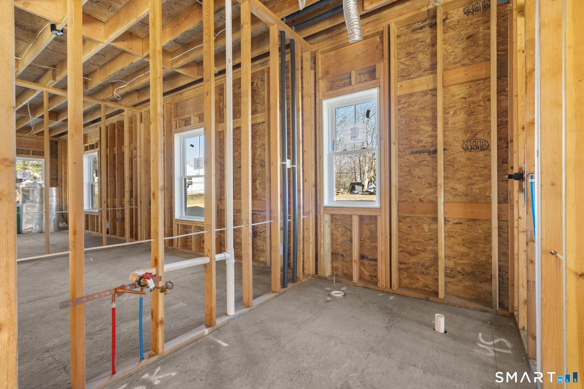 154 A Long Meadow Hill Road Brookfield, CT 06804 - Photo 10 of 28 an empty room with windows