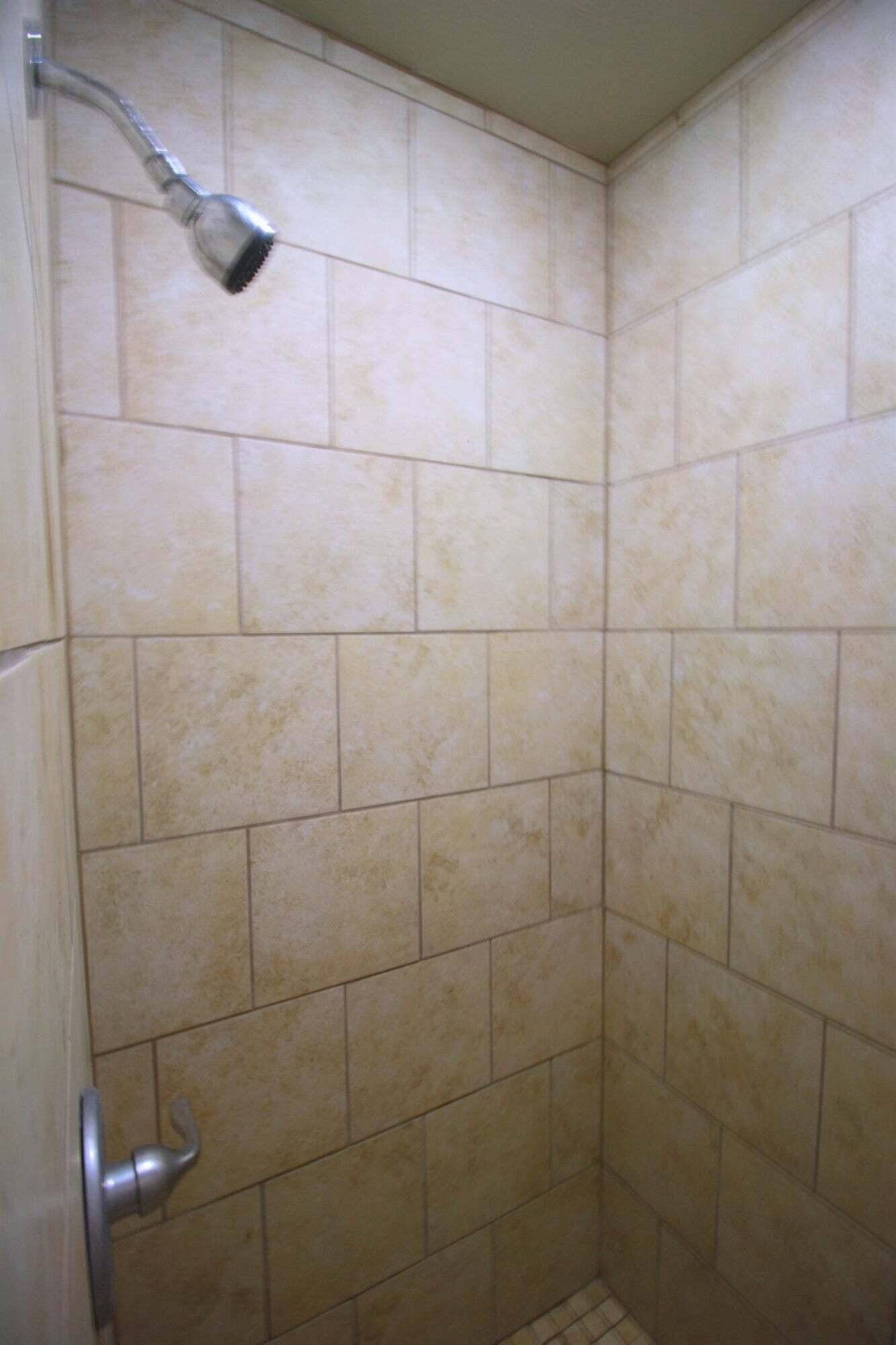 2611 28th Street Lubbock, TX 79410 - Photo 14 of 22 a bathroom with a shower
