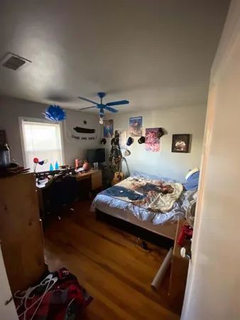 a room with furniture and air hockey table