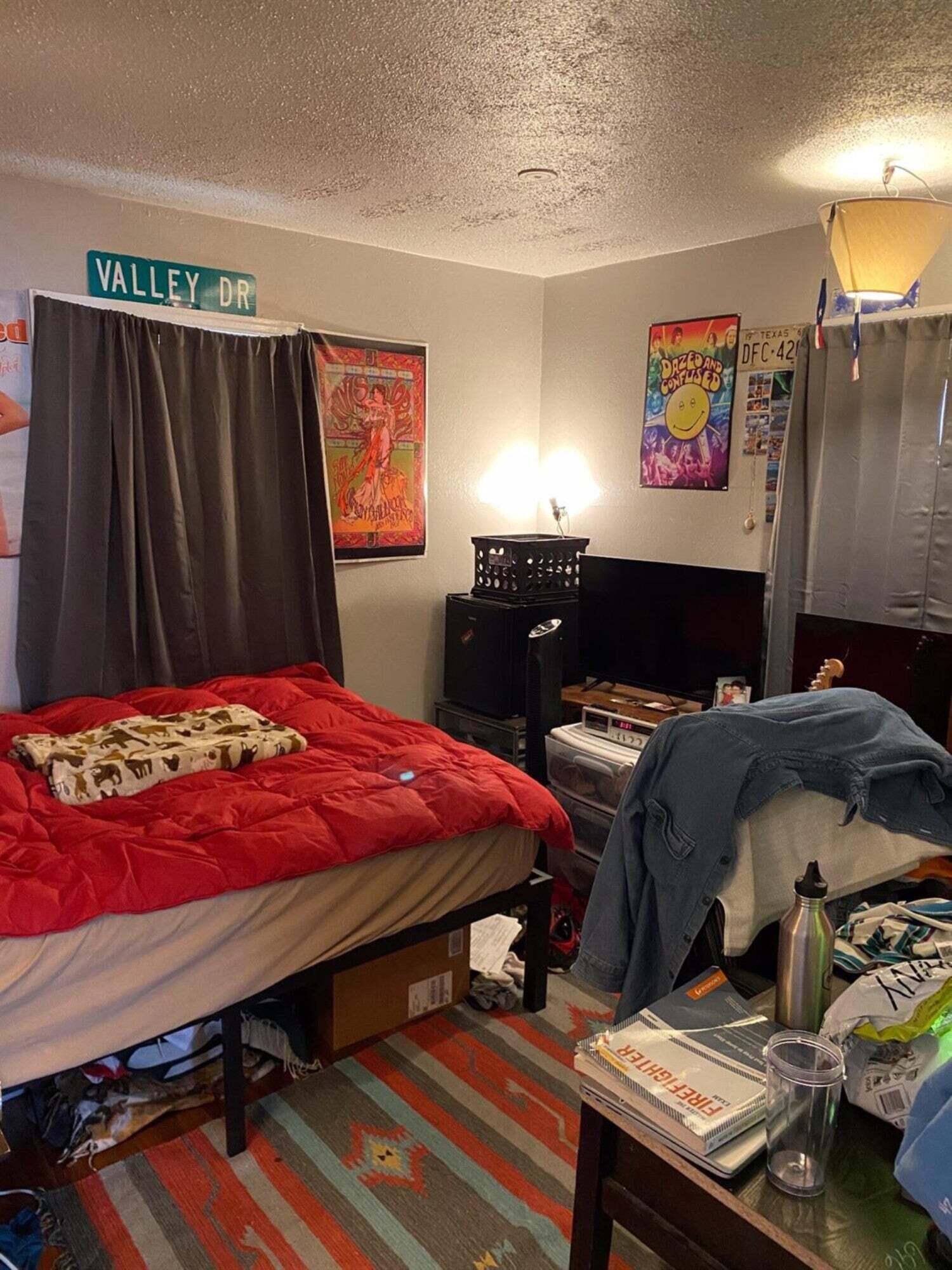 2611 28th Street Lubbock, TX 79410 - Photo 20 of 22 a bed room with a bed and a closet