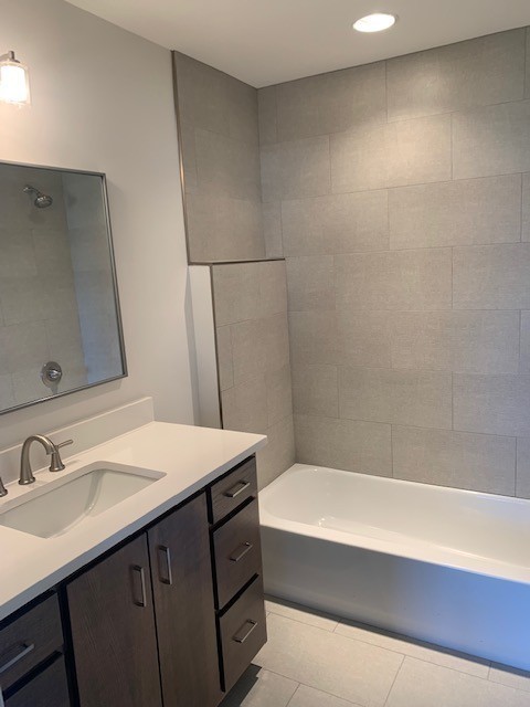 326 West Main Street, Unit 1 Lebanon, TN 37087 - Photo 62 of 63 a bathroom with a sink and a mirror