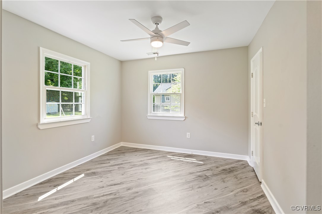 3605 Dupuy Road Petersburg, VA 23803 - Photo 13 of 31 Unfurnished room featuring wood finished floors an