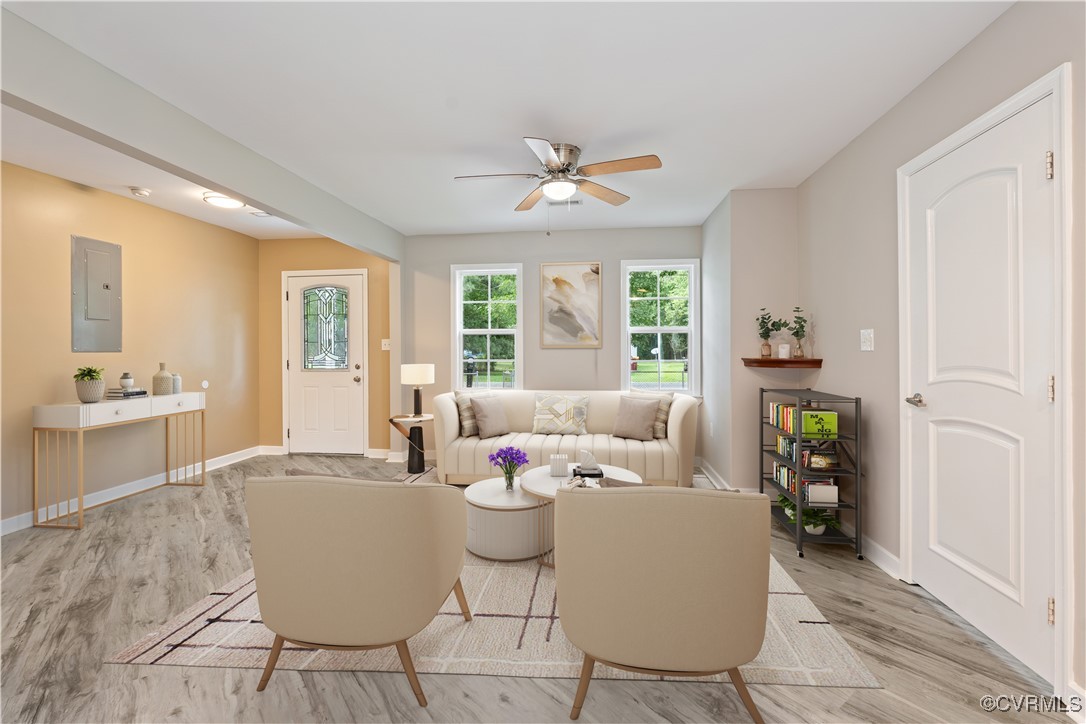 3605 Dupuy Road Petersburg, VA 23803 - Photo 17 of 31 Living area with light wood-style floors, ceiling