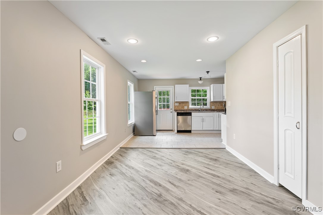 3605 Dupuy Road Petersburg, VA 23803 - Photo 19 of 31 Unfurnished living room with light wood-style floo