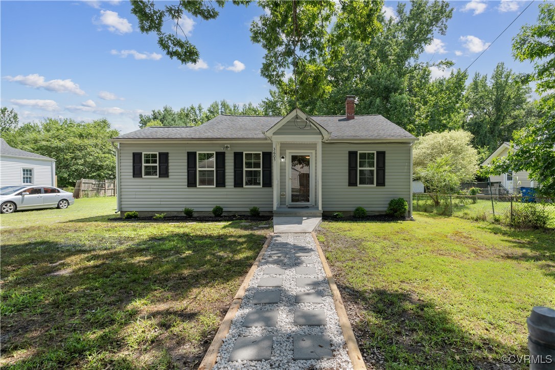 3605 Dupuy Road Petersburg, VA 23803 - Photo 22 of 31 View of front of home with a chimney and roof with