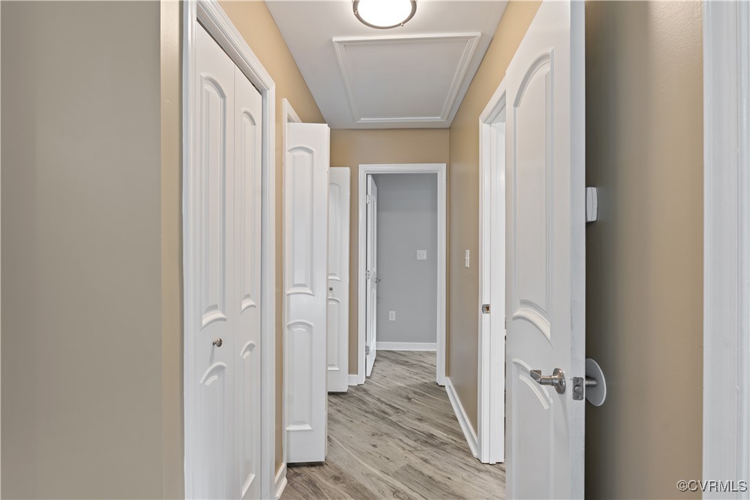 3605 Dupuy Road Petersburg, VA 23803 - Photo 9 of 31 Corridor with light wood finished floors and baseb