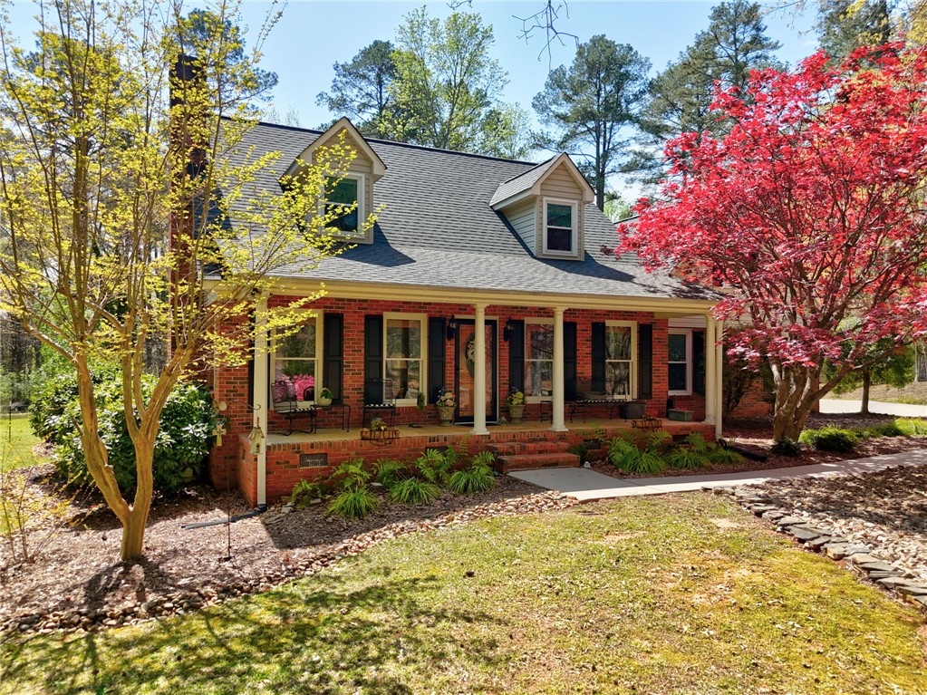 1010 Ridgeview Drive Pendleton, SC 29670 - Photo 1 of 47 This charming home offers a welcoming front porch, dormer windows, and a classic brick exterior.