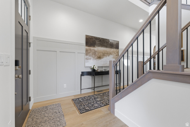 2559 West Aurora Avenue Mapleton, UT 84664 - Photo 25 of 60 Entryway featuring wood-finish flooring and wainscoting